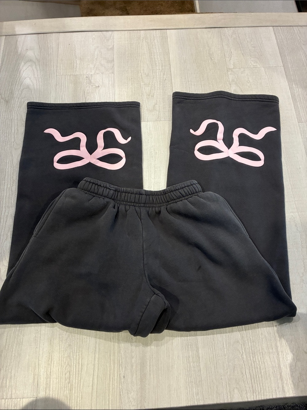 Edikted Black Sweatpants with Pink Graphic Logo